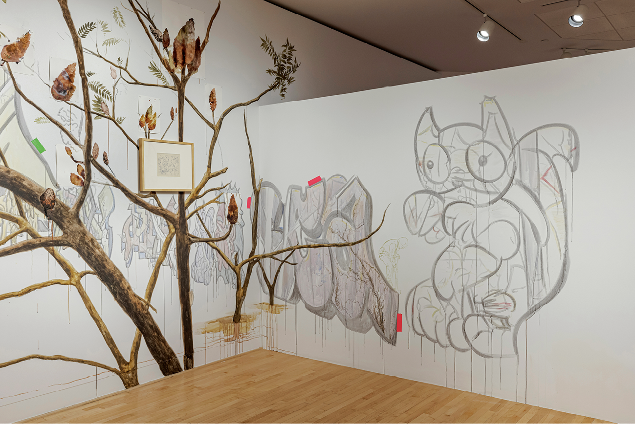 The close-up of a mural shows sumac trees, a cartoon squirrel and graffiti art.