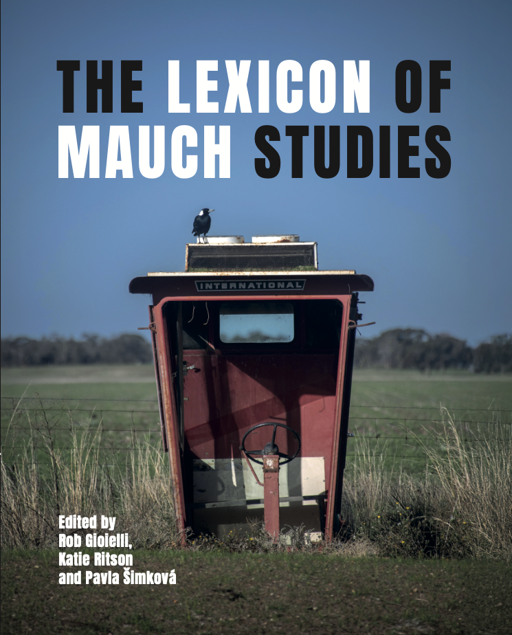Cover of a book, showing a photograph of a tractor cab embedded in a field, with a bird standing on top of it.